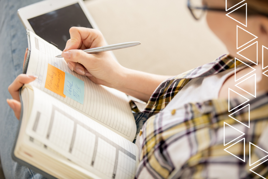 Person writing in diary